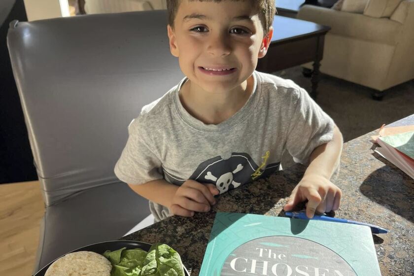 This October 2022 photo provided by Kristin Stonehouse shows her son, Mason Stonehouse, 6, in Chesterfield, Mich. Mason Stonehouse used his father’s Grubhub account to order $1,000 worth of food delivered to his home on Saturday, Jan. 28, 2023. His father, Keith Stonehouse, was not aware his son was ordering the food and at first did nt understand why delivery people kept ringing his doorbell and leaving food. (Kristin Stonehouse via AP)