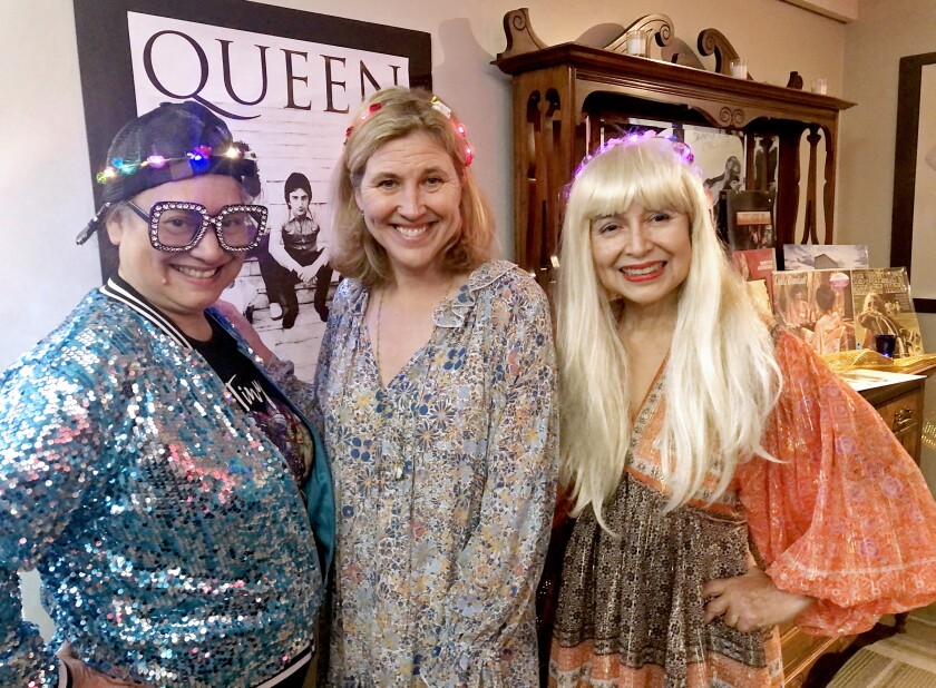 Trish McRae, Jill Chapman and Alice Perez enjoy the La Cañada Junior Women's Club gala, "A Night at the Troubador." Chapman is president of the club; McRae and Perez e co-chaired the event.