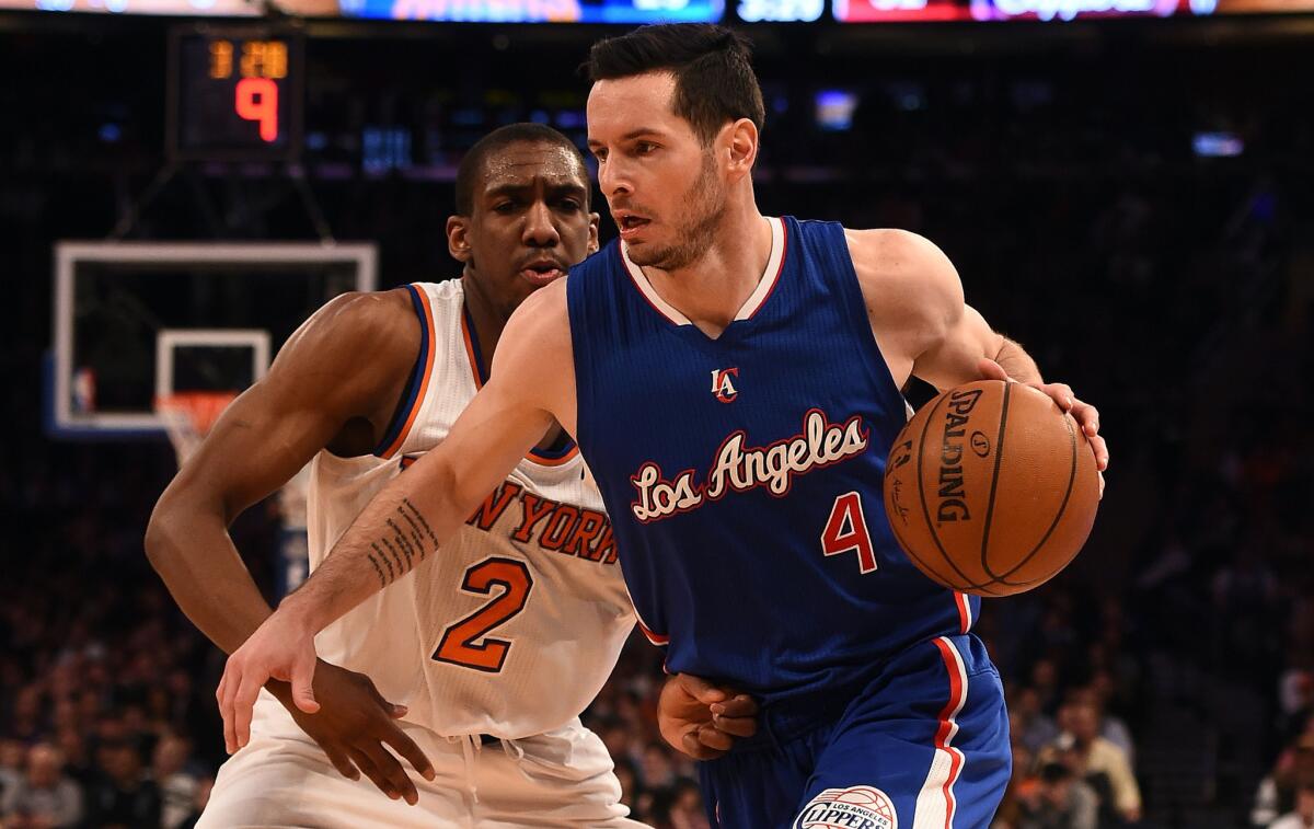 Clippers guard J.J. Redick (4) drives past Knicks guard Langston Galloway on Wednesday night in New York.