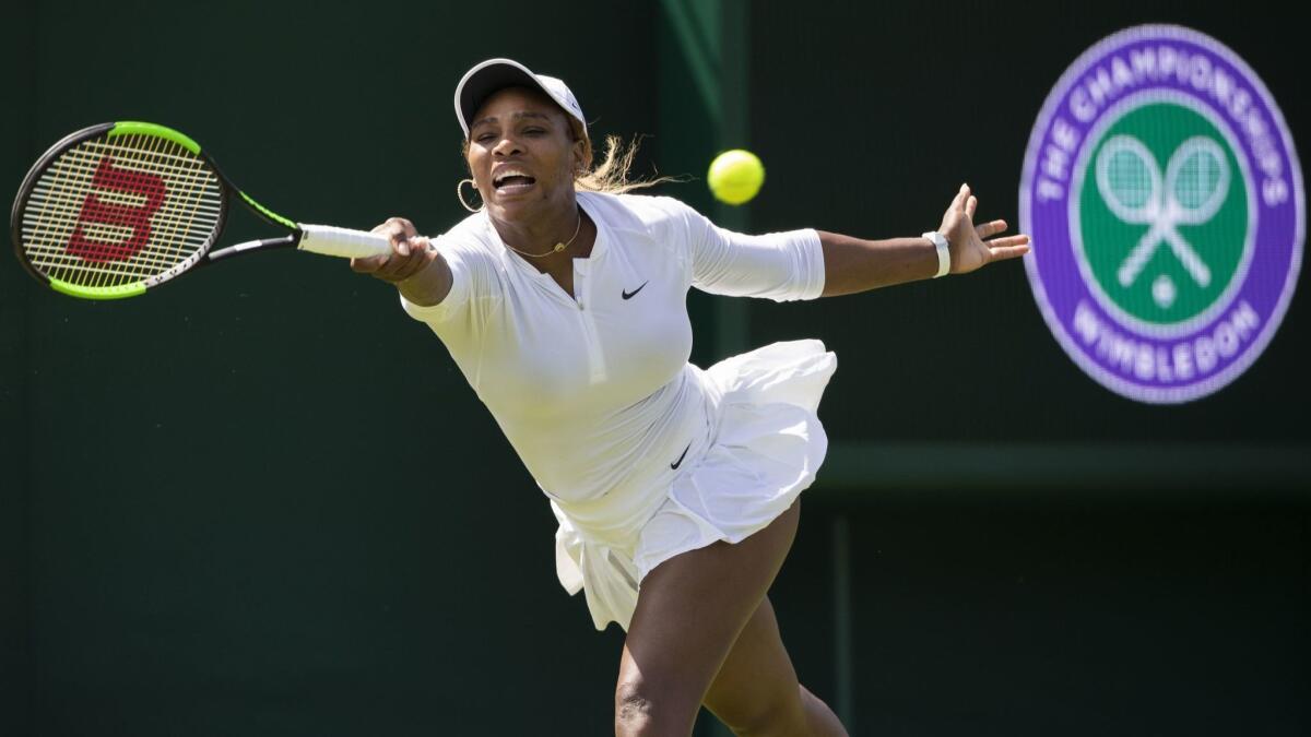 Serena Williams returns a shot during a training session for Wimbledon at the All England Club.