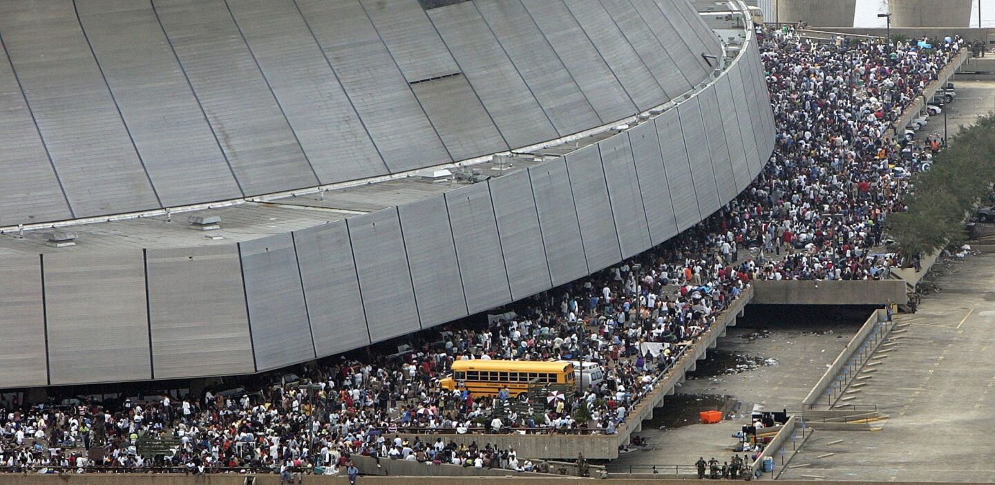 Victims of Hurricane Katrina are shown outside the Louisiana Superdome as they wait for evacuation IN 2005.