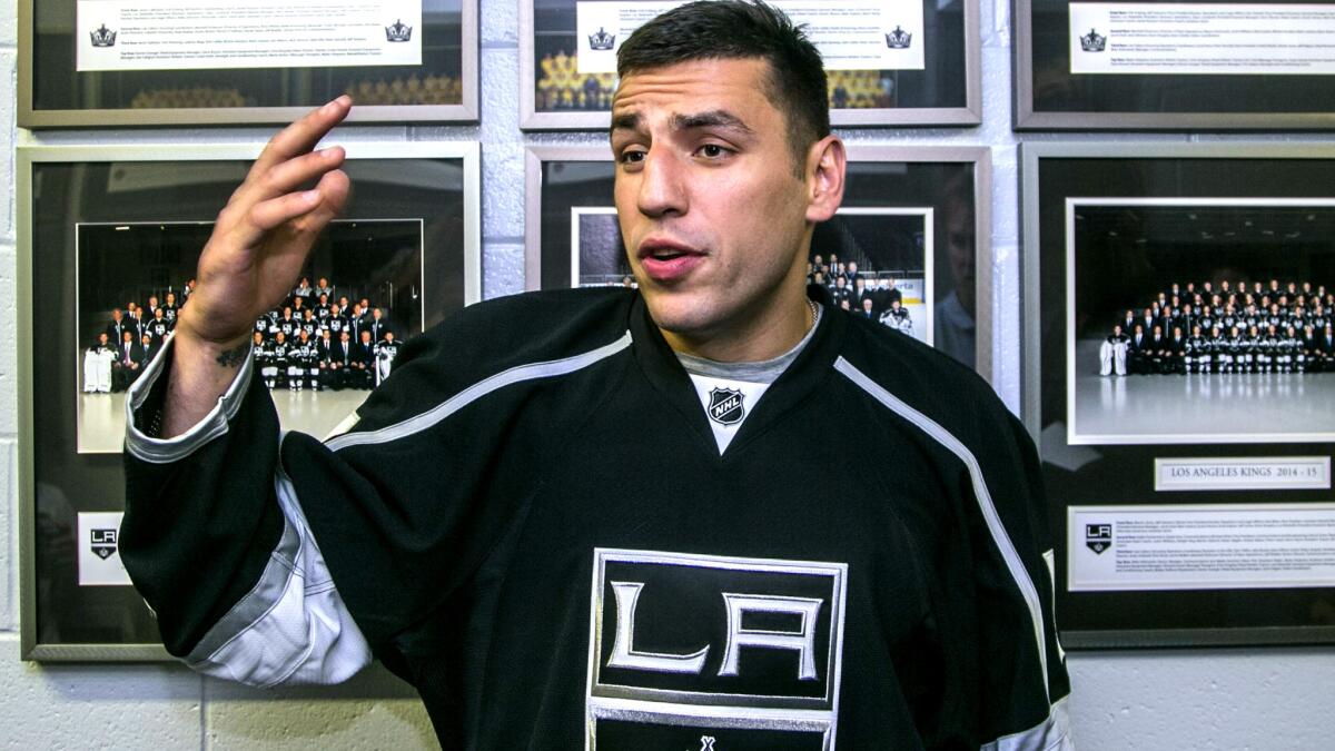Milan Lucic takes questions from members of the media after the former Bruins winger was introduced as the newest member of the Kings on Saturday in El Segundo.