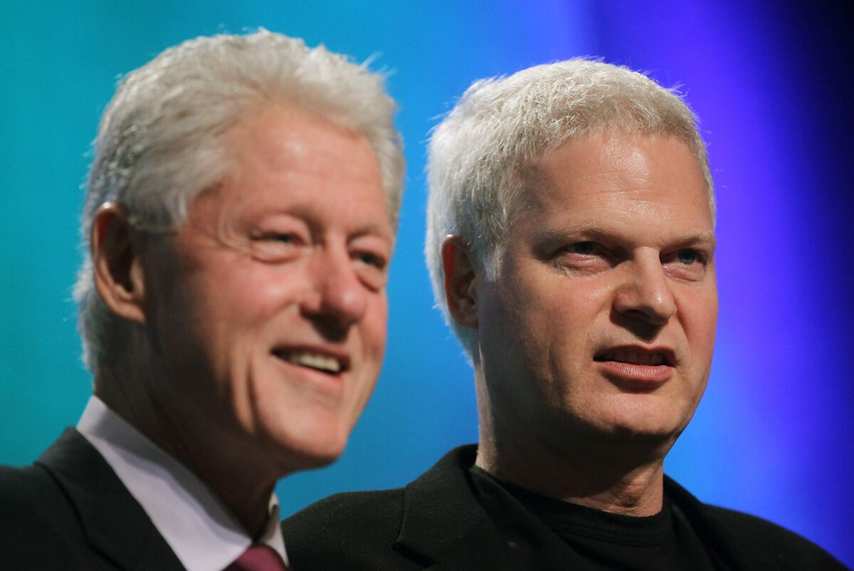Former U.S. President Bill Clinton with Hollywood mogul Steve Bing at the 2010 Clinton Global Initiative.