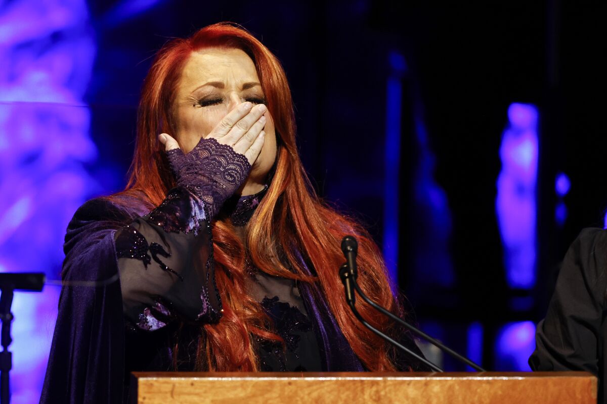 Wynonna Judd blows a kiss to attendees during the Medallion Ceremony at the Country Music Hall Of Fame Sunday, May 1, 2022, in Nashville, Tenn. (Photo by Wade Payne/Invision/AP)