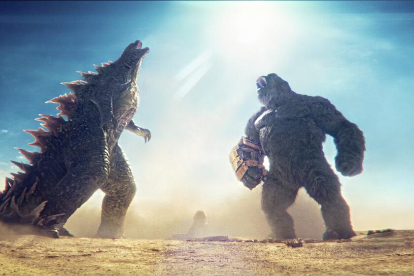 This image released by Warner Bros. Pictures shows Godzilla, left, and Kong in a scene from "Godzilla x Kong: The New Empire." (Warner Bros. Pictures via AP)