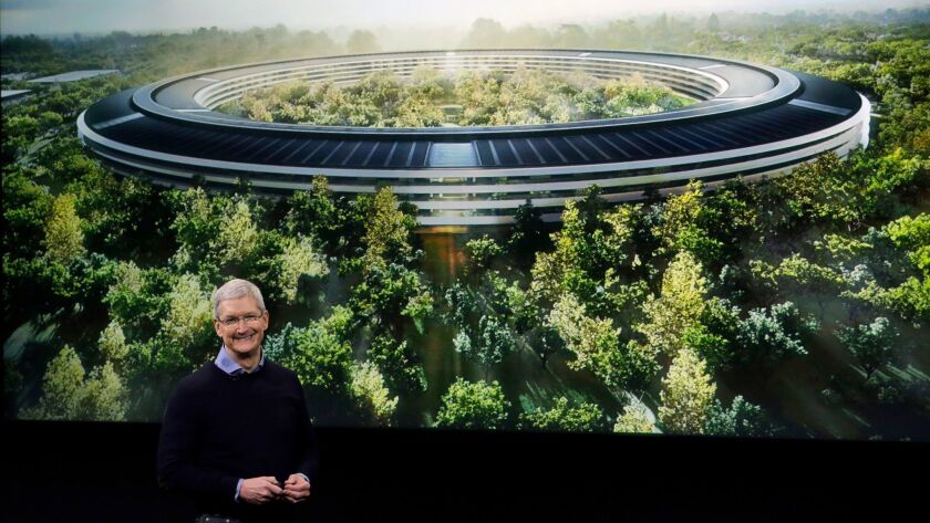 Apple CEO Tim Cook discusses the new Apple campus in Cupertino, Calif., last year.