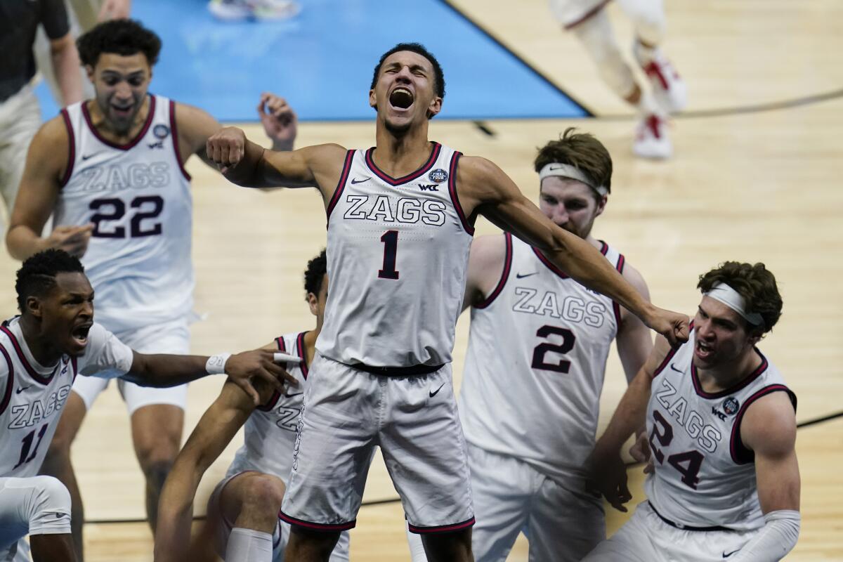 Gonzaga guard Jalen Suggs celebrates after making the winning basket in overtime against UCLA.