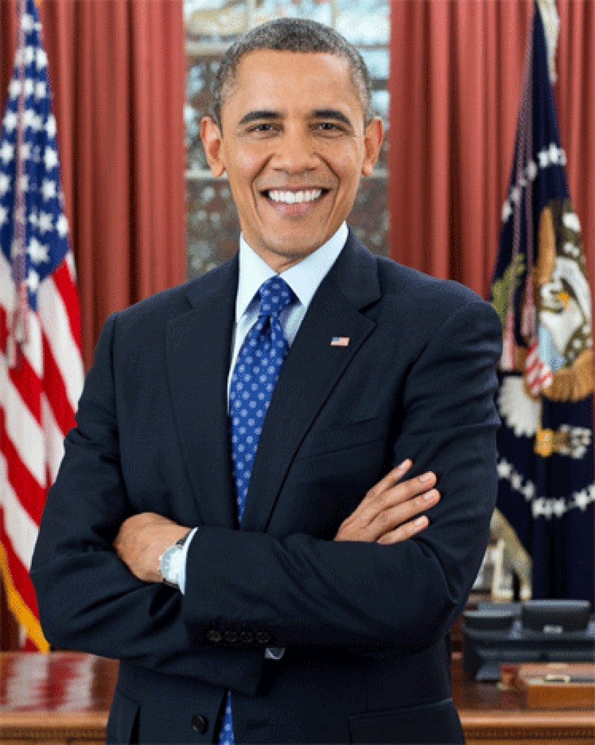President Obama is seen in the Oval Office in this official portrait taken on Dec. 6, 2012.