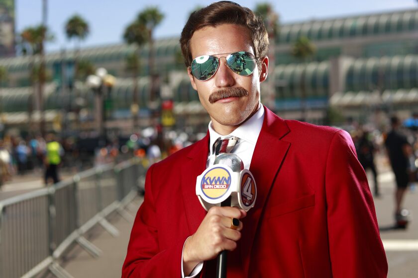 San Diego, CA - JULY 22: Evan Stiles of San Diego dressed as Ron Burgundy at Comic-Con in San Diego on Friday, July 22, 2022. (K.C. Alfred / The San Diego Union-Tribune)
