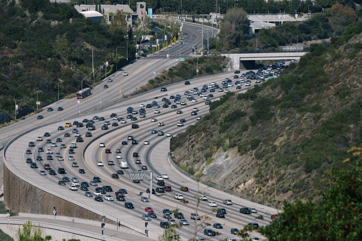 Many cars are seen driving along the 405 Freeway on Nov. 26 in Los Angeles.