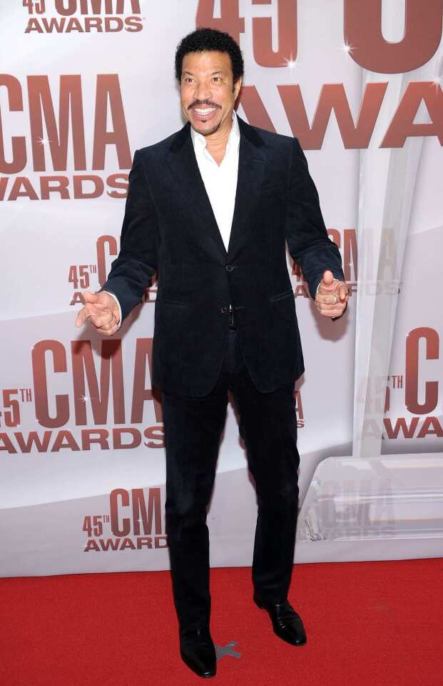 R&B star Richie arrives for the CMA Awards.
