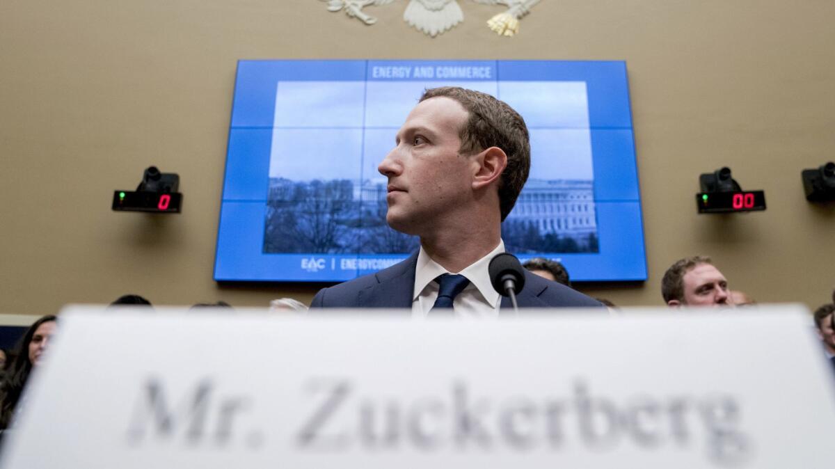 Facebook CEO Mark Zuckerberg arrives to testify before a House committee in April 2018.