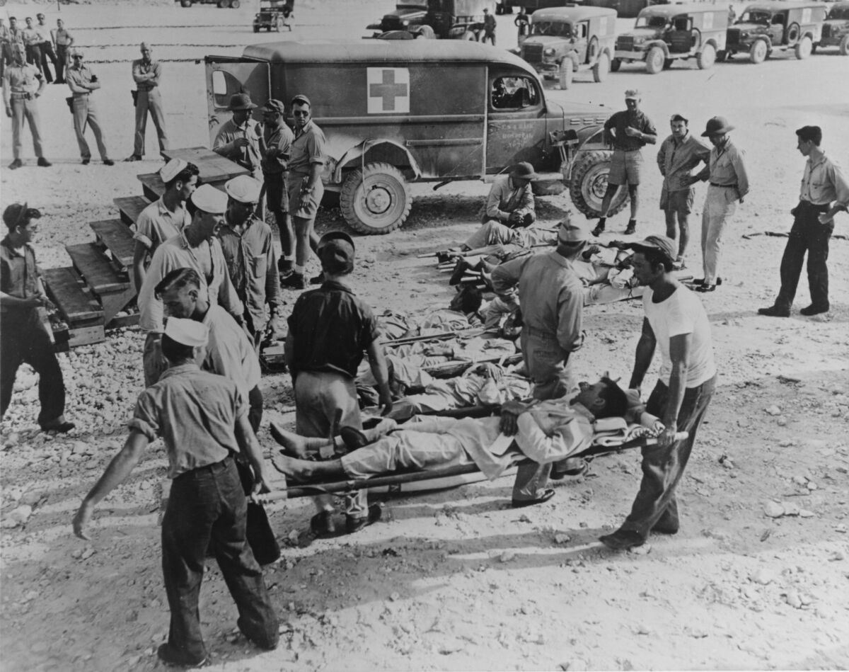 Survivors of the Indianapolis are taken to hospitals after their rescue in August 1945. Out of 1,196 crew members, only 316 were rescued nearly five days after the ship went down in shark-infested waters.