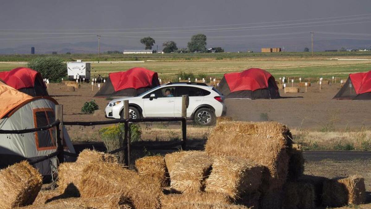 Visitors arrive early in Madras, Ore., to view the total solar eclipse.