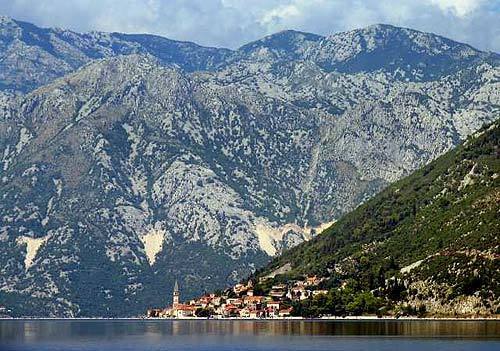 Cost-conscious travelers choose tiny Montenegro and coastal towns such as Perast, on the edge of the Bay of Kotor, for bargains and adventure.