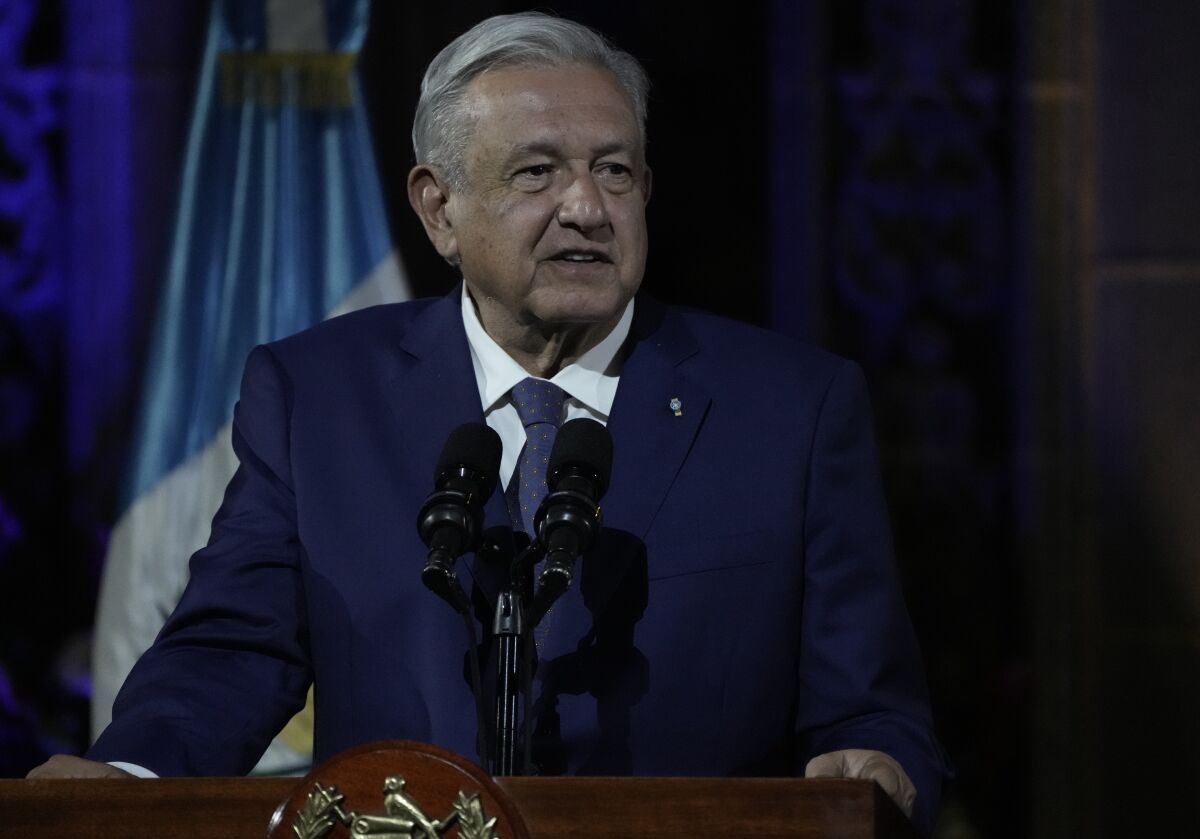 Mexico's President Andres Manuel Lopez Obrador speaks during a joint statement with Guatemalan President Alejandro Giammattei at the National Palace in Guatemala City, Thursday, May 5, 2022. (AP Photo/Moises Castillo)