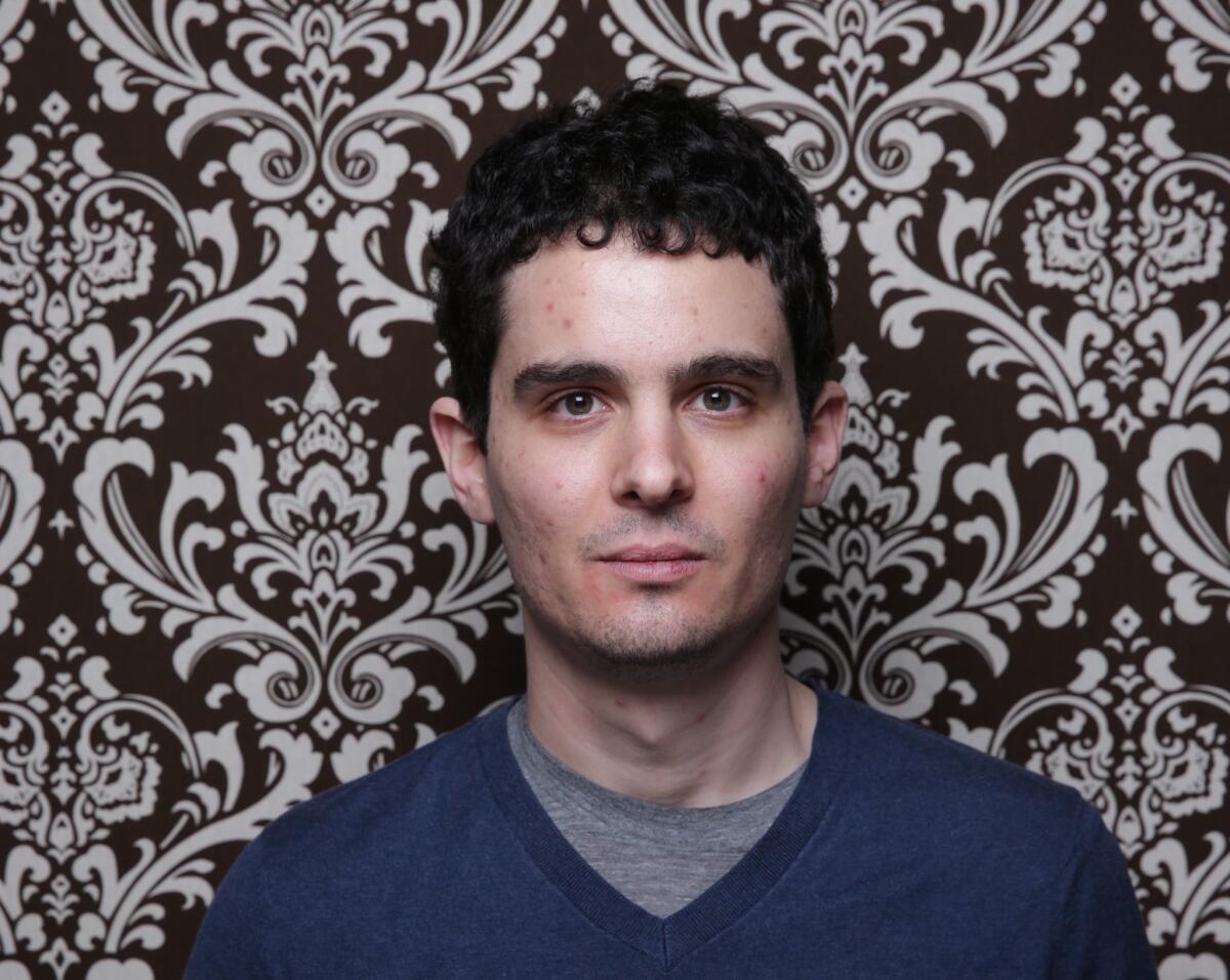 "Whiplash" director Damien Chazelle is in talks to direct "First Man," about astronaut Neil Armstrong.