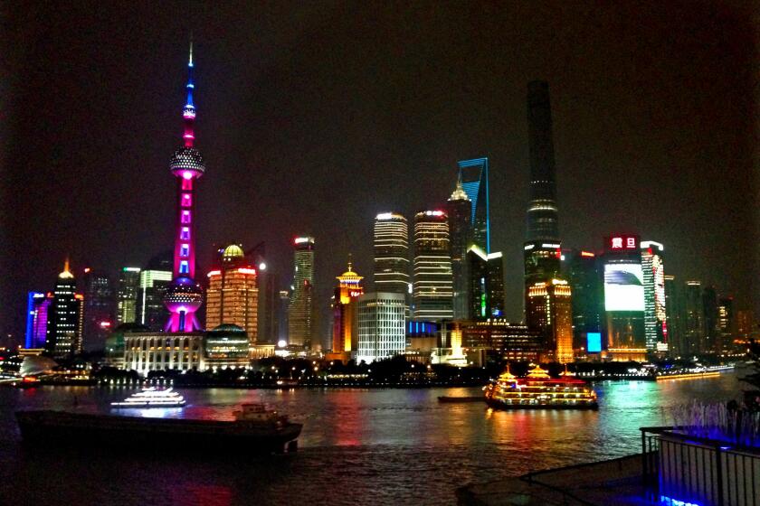 SHANGHAI, CHINA: The high-rises of Pudong, on the east bank of the Huangpu River in central Shanghai, as seen from the Bund.