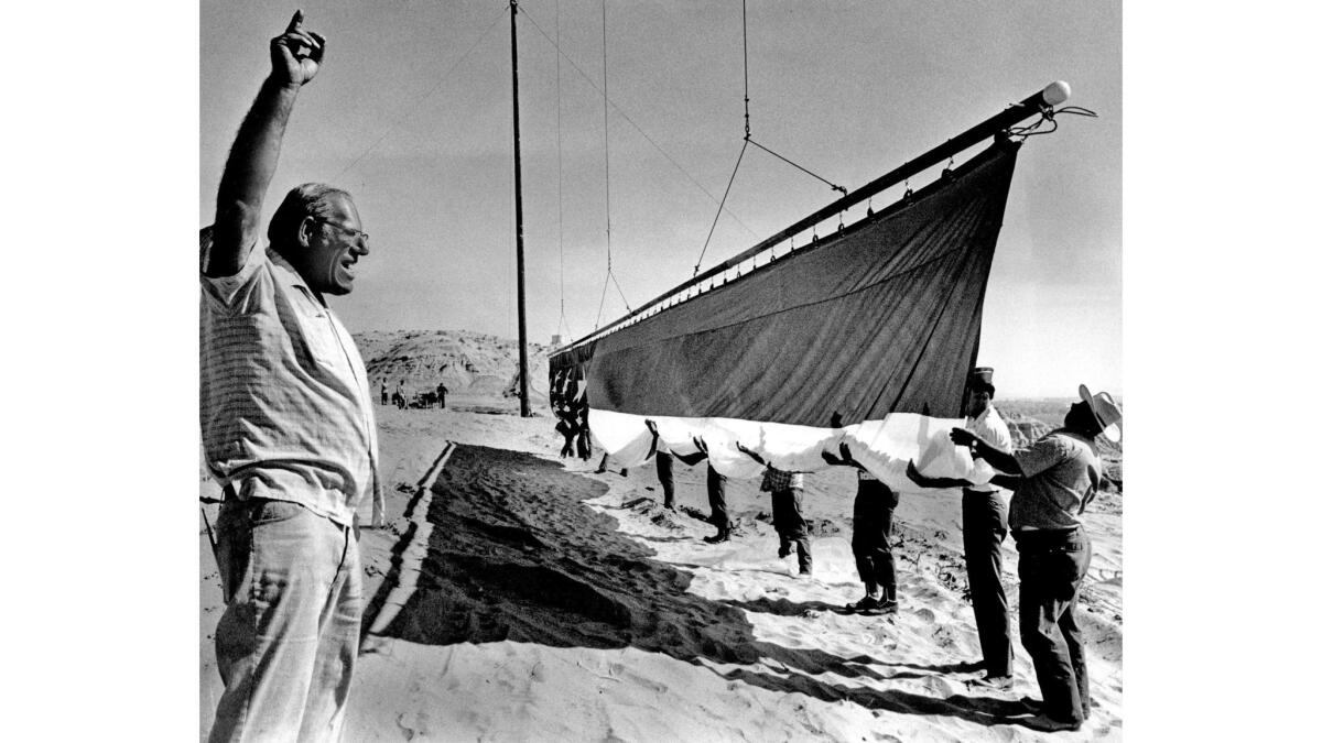 June 25, 1976: Rancher Bob Older directs test unfurling of his giant flag before the official July 4th ceremony.