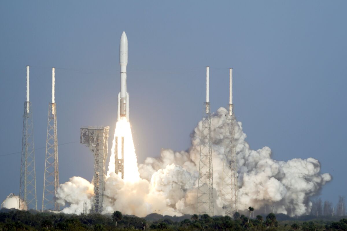 A United Launch Alliance Atlas V rocket, carrying America’s newest weather satellite, lifts off from Space Launch Complex 41 at the Cape Canaveral Space Force Station, Tuesday, March 1, 2022, in Cape Canaveral, Fla. The satellite will be designated GOES-18 and will improve wildfire and flood forecasting across the western half of the country. (AP Photo/John Raoux)