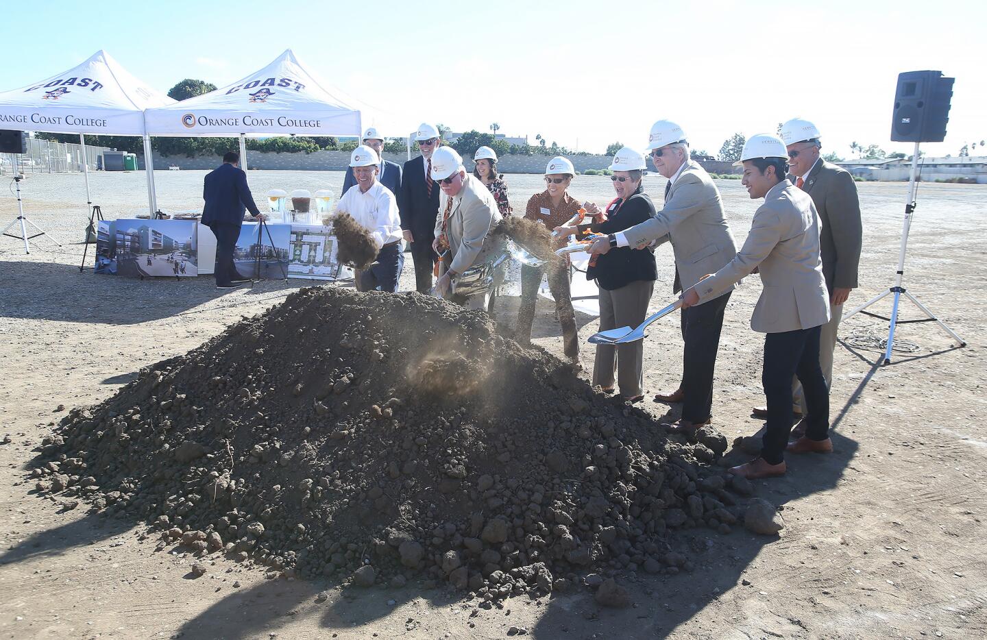 Orange Coast College officials break ground on the Costa Mesa campus' student housing project Thursday. The project is set to be completed in fall 2020 with 323 fully furnished apartment-style units containing 814 beds.