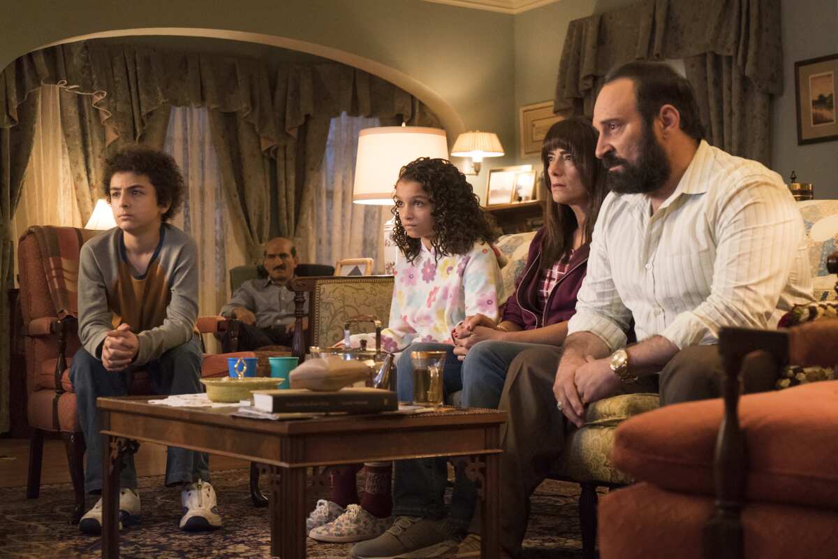 Young Ramy (Elisha Henig), Farouk (Amr Waked), young Dena (Caroline Basu), Maysa (Hiam Abbass) and Uncle Naseem (Laith Nakli) in "Strawberries," the Sept. 11-themed episode of Hulu's "Ramy."