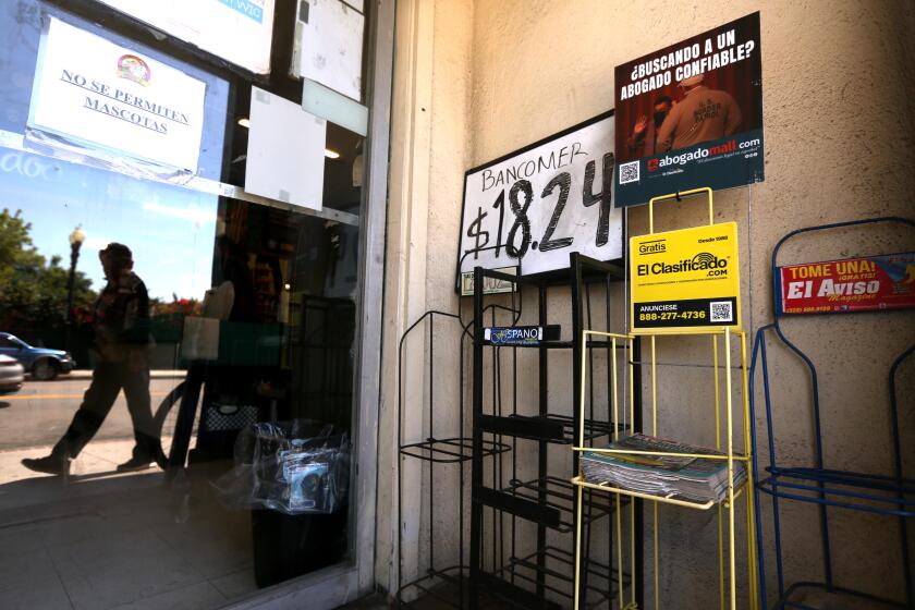 SANTA ANA, CA - JUNE 26, 2024 - Empty news racks still remain standing at the entrance to the Novy Ranch Market in downtown Santa Ana on June 26, 2024. There are no Spanish language newspapers being printed in Santa Ana. (Genaro Molina/Los Angeles Times)