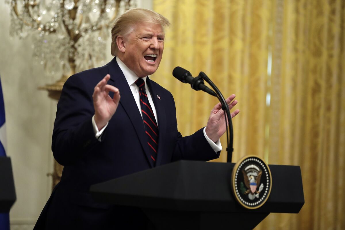 Then-President Trump speaks in the East Room of the White House on Oct. 2, 2019.