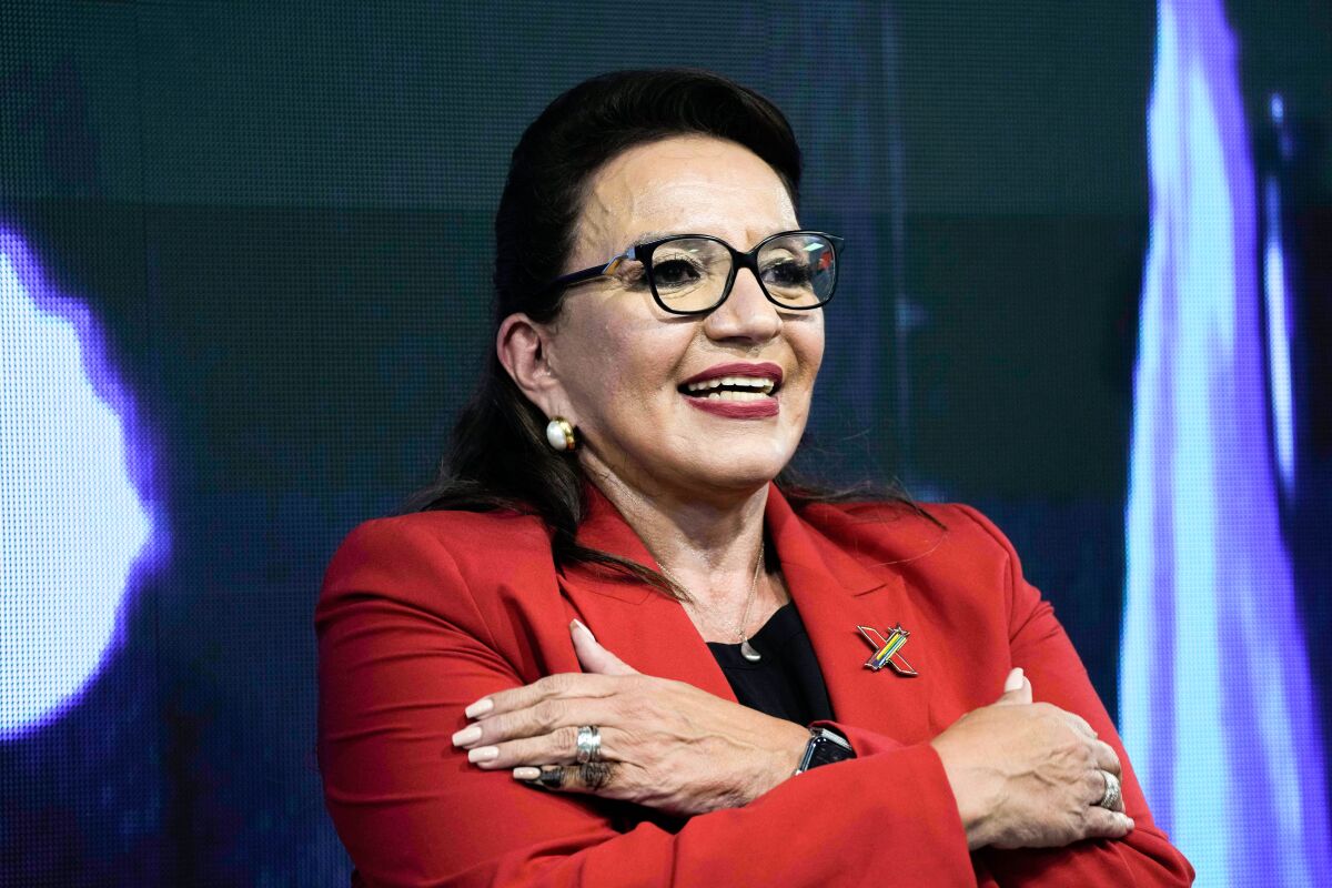 Free Party presidential candidate Xiomara Castro greets her supporters.