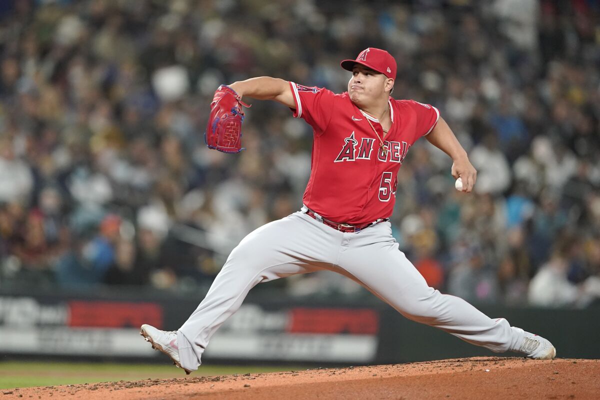 Los Angeles Angels starting pitcher Jose Suarez throws against the Seattle Mariners during the second inning of a baseball game, Friday, Oct. 1, 2021, in Seattle. (AP Photo/Ted S. Warren)