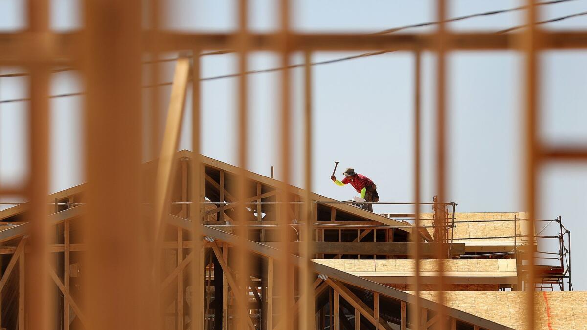 New homes are under construction in Victorville, where the housing market is still recovering from the recession.