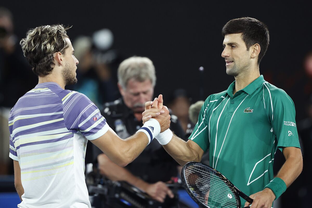 Dominic Thiem, left, shakes hands with Novak Djokovic after their match at the Australian Open in February.