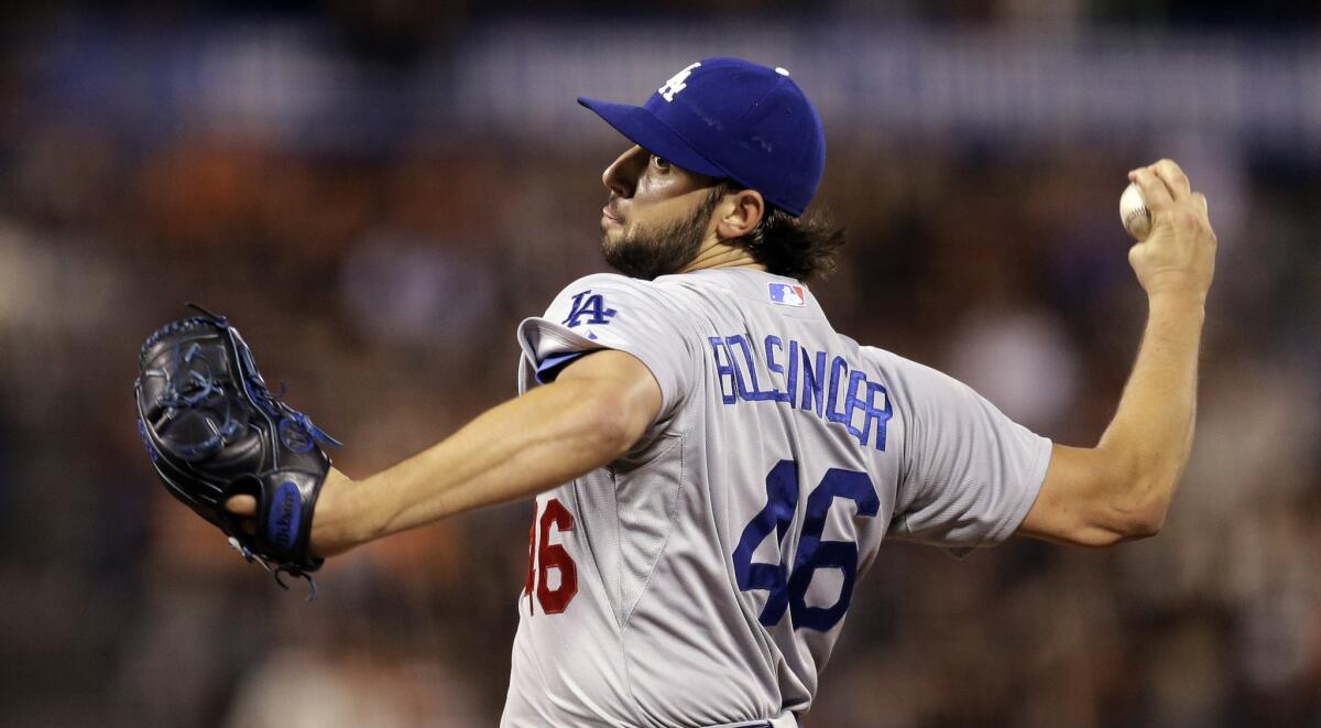 Dodgers pitcher Mike Bolsinger works against the San Francisco Giants in the first inning of a Sept. 30 game at AT&T Park.