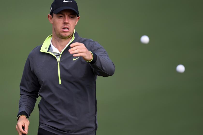 Rory McIlroy of Northern Ireland practices April 6 at Augusta National Golf Club before the start of the Masters.
