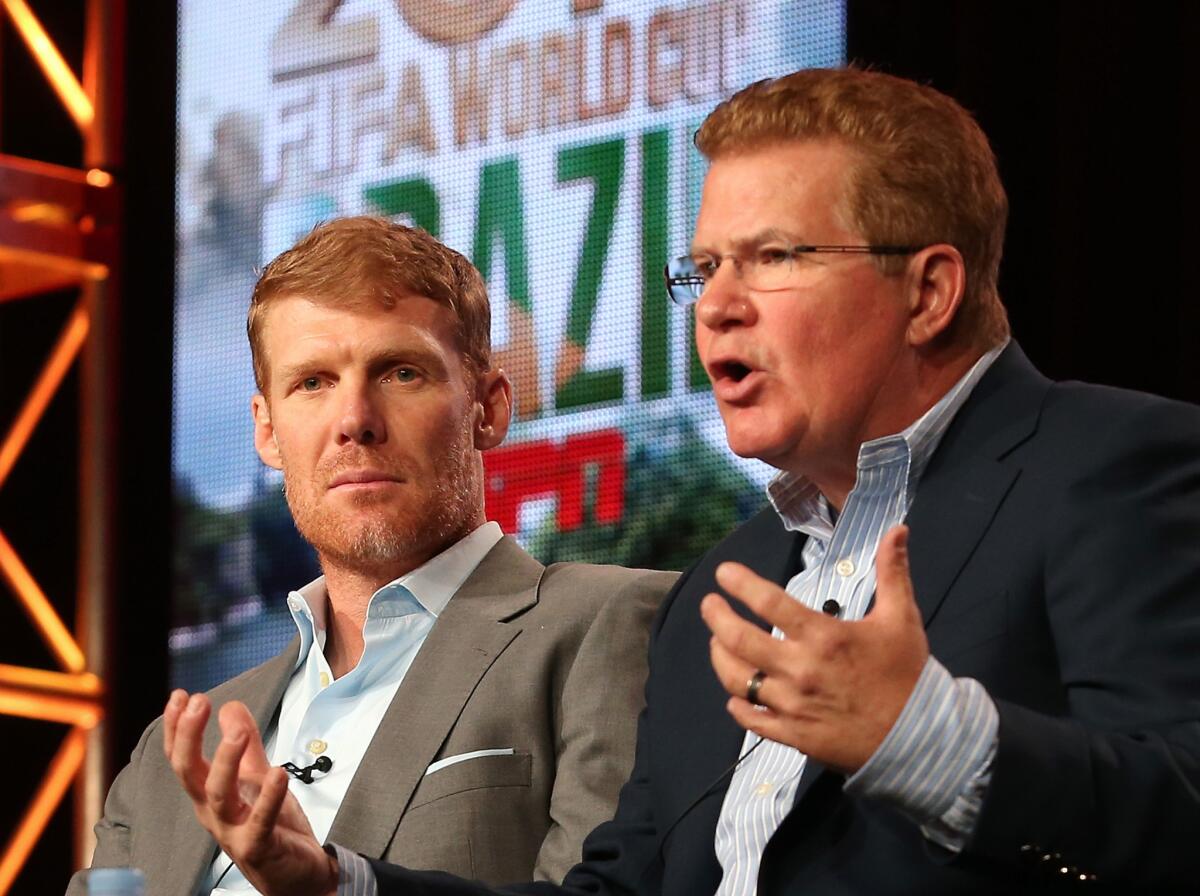 Alexi Lalas, soccer studio analyst and U.S. Men's National Team defender during the 1994 FIFA World Cup, and Jed Drake, senior vice president and executive producer, ESPN Event Production.