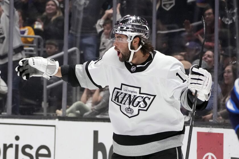Los Angeles Kings left wing Alex Iafallo celebrates after scoring against the Winnipeg Jets during the second period of an NHL hockey game Saturday, March 25, 2023, in Los Angeles. (AP Photo/Marcio Jose Sanchez)