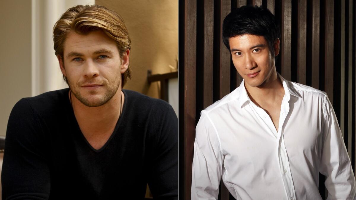 Actor Chris Hemsworth and Chinese pop singer Leehom Wang, stars of a forthcoming Michael Mann thriller.