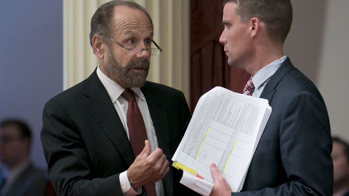 A new proposal by state Sen. Jerry Hill (D-San Mateo), left, would expand the state’s transparency laws on StingRays and extend it to all surveillance devices. (Rich Pedroncelli / Associated Press)