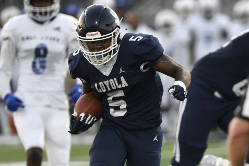 Loyola running back Tahj Owens on his way to scoring five touchdowns against Culver City.