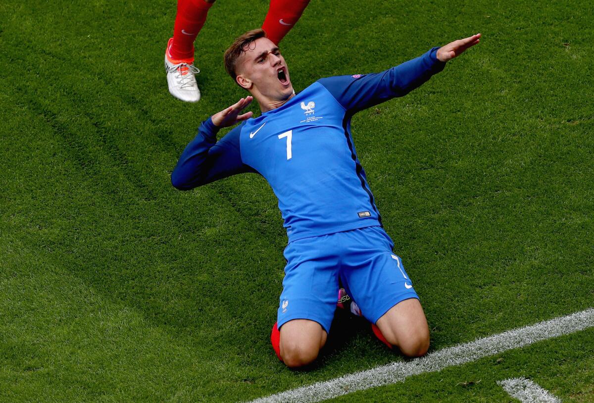 France's Antoine Griezmann celebrates scoring his team's first goal during a Euro 2016 round of 16 match against Ireland.