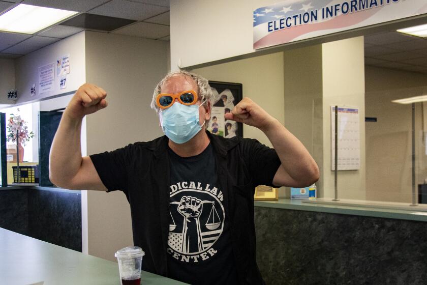 NORWALK, CA - JULY 16, 2021: Criminal defense attorney Dan Kapelovitz of Hollywood reacts after filling his paperwork to be a recall candidate for governor at the County Registrar on July, 16, 2021 in Norwalk, California.(Gina Ferazzi / Los Angeles Times)