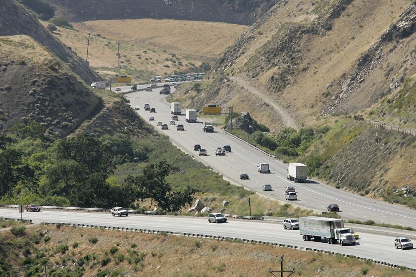 Vehicles traverse Interstate 5 in an area known as "The Grapevines" near Lebec, Calif.  on Friday, June 6, 2008. (AP Photo/Dan Steinberg)