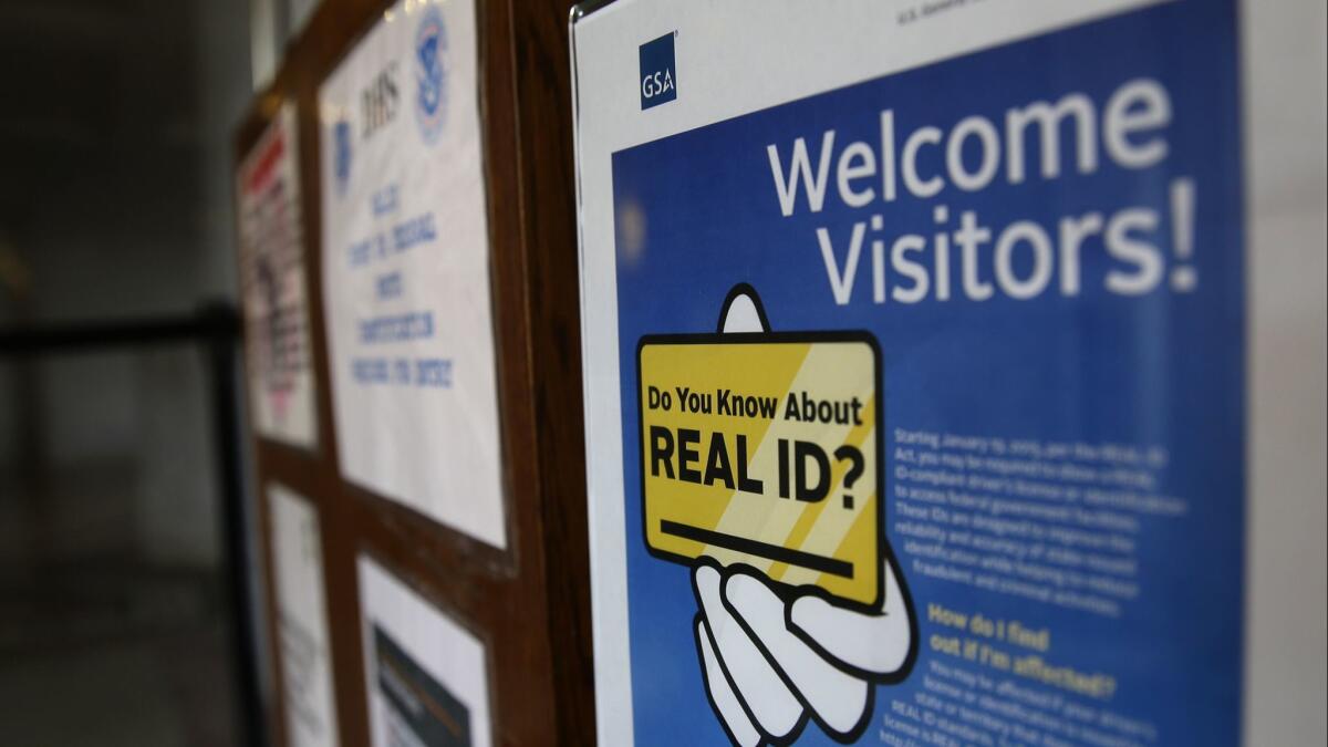 A sign at the federal courthouse in Tacoma, Wash., informs visitors of the Real ID act.