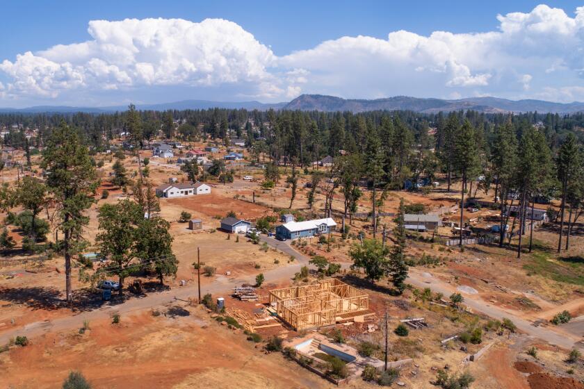 The Camp Fire destroyed Paradise, CA, in 2018. Residents are rebuilding but still grappling with the trauma of losing homes and loved ones. A few new homes have been built on Fairview Drive.