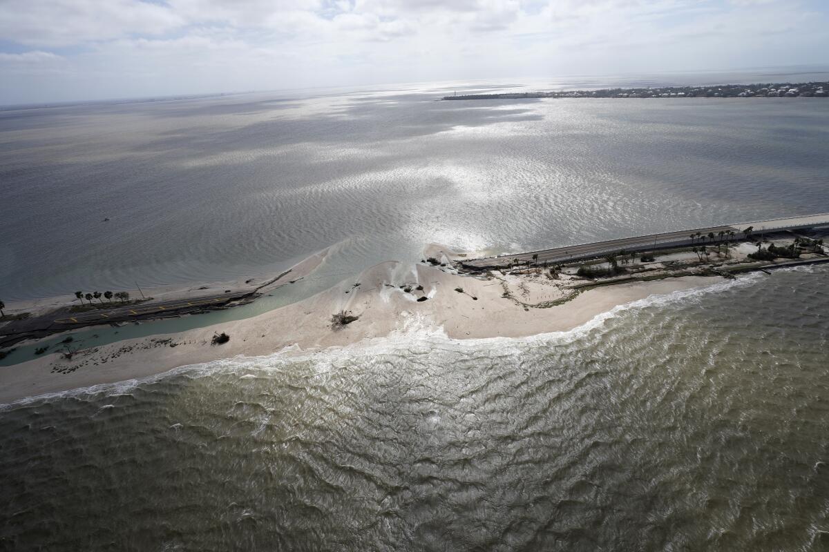 An aerial view of a damaged causeway