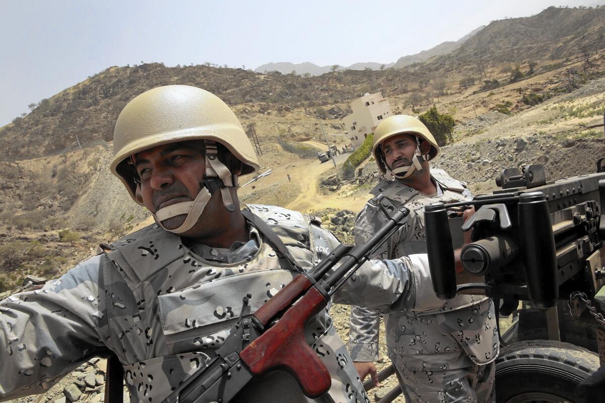 Saudi guards patrol near the town of Addayer, not far from the border with Yemen.