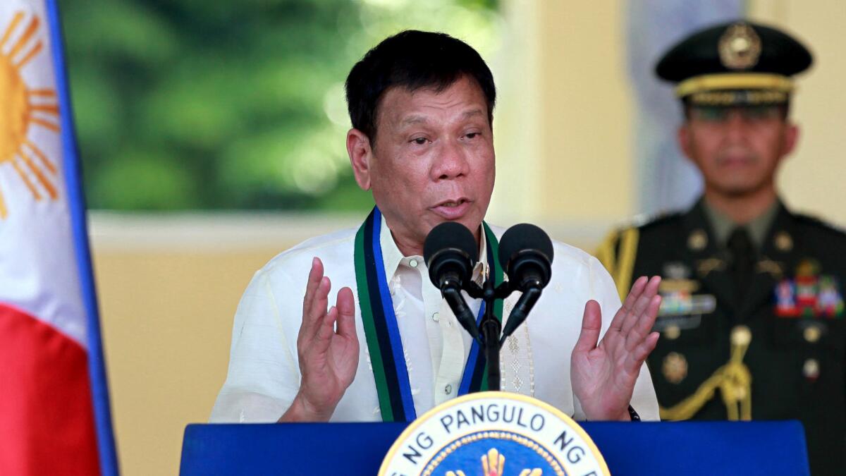 Philippine President Rodrigo Duterte speaks at a military ceremony in suburban Quezon city, northeast of Manila.