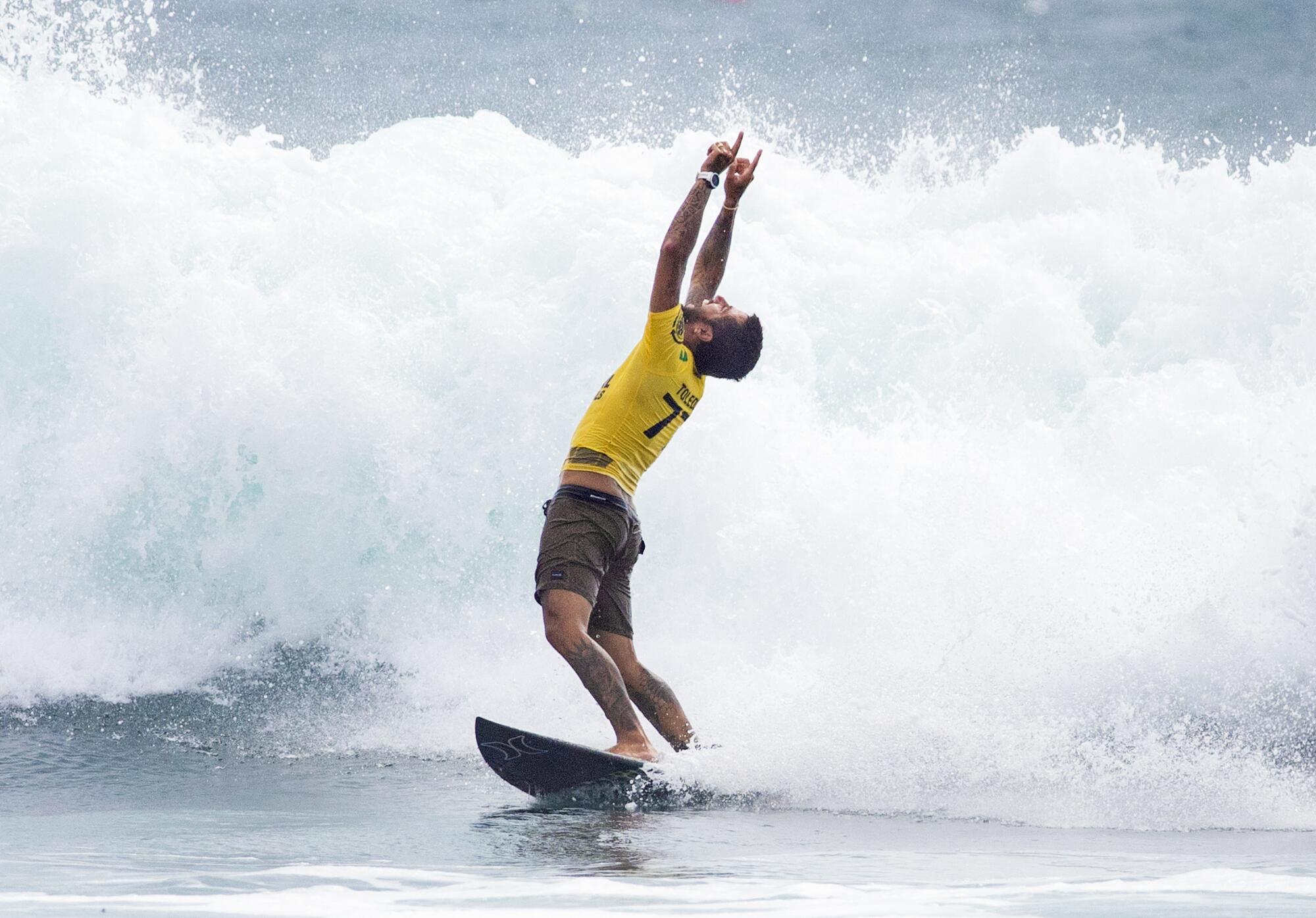 Filipe Toledo celebrates beating Italo Ferreira to win the WSL Finals.