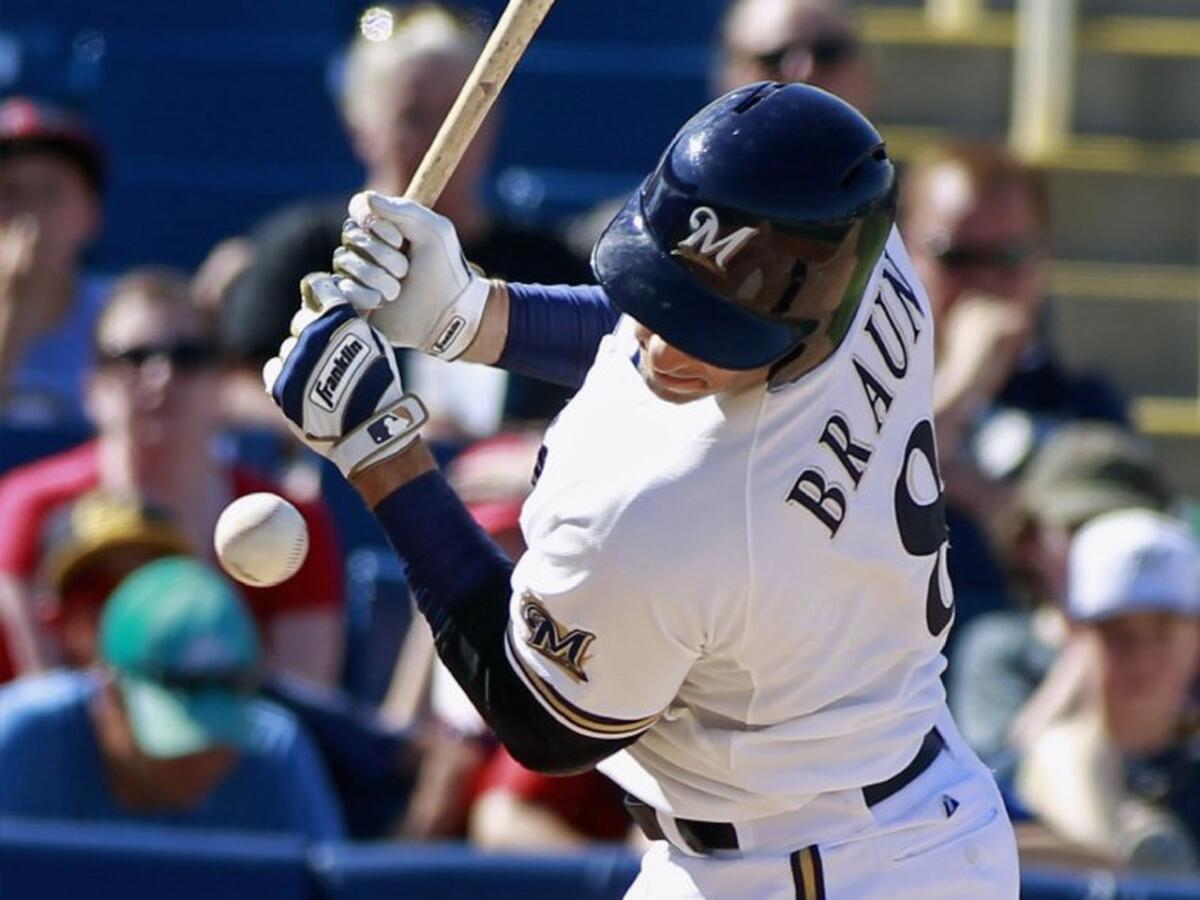 Brewers slugger Ryan Braun left the season opener against Colorado on Monday because of a muscle strain on his right side.