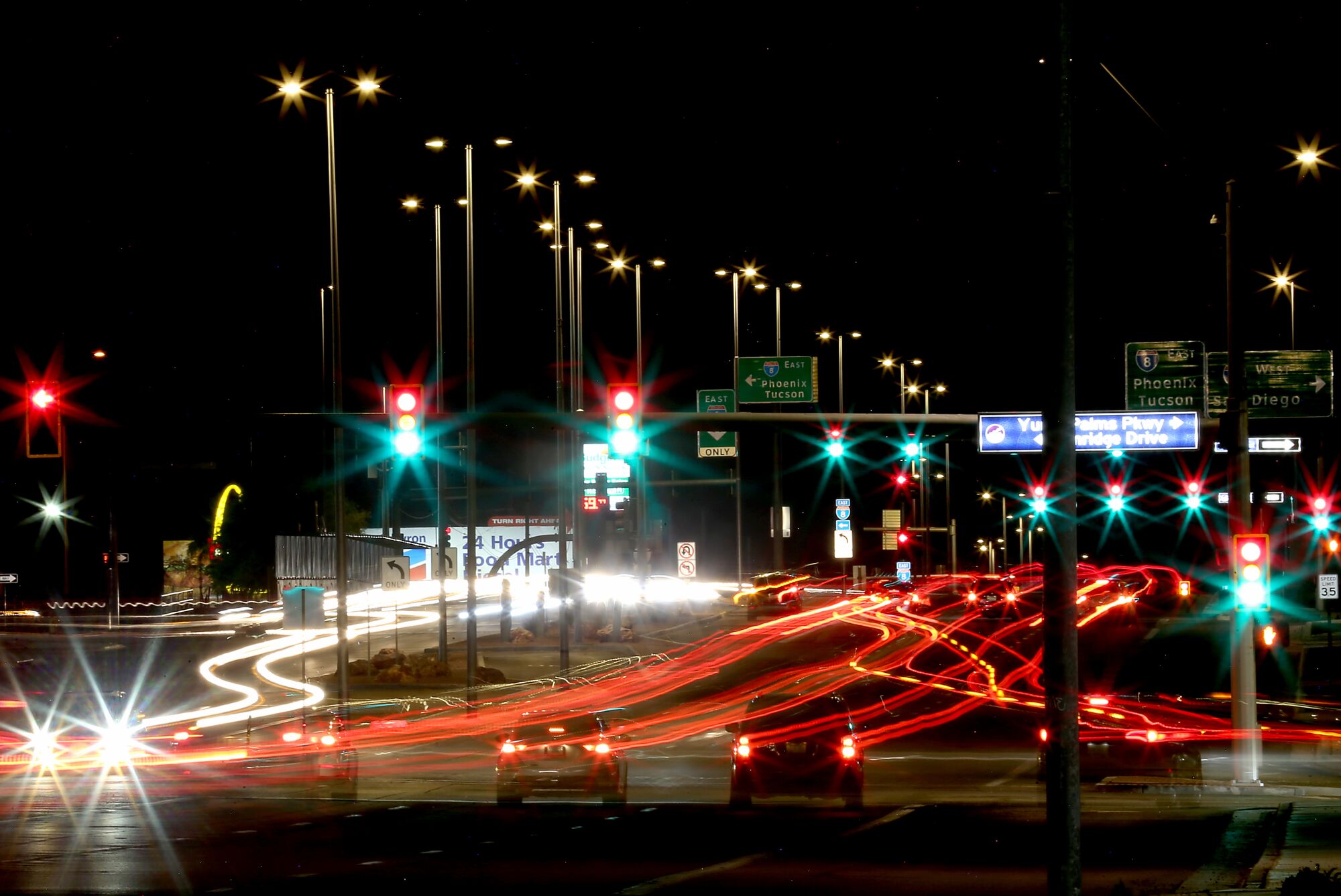 Traffic streams down U.S. Highway 95 in Yuma, a crossroads between Phoenix, San Diego and Mexico. 